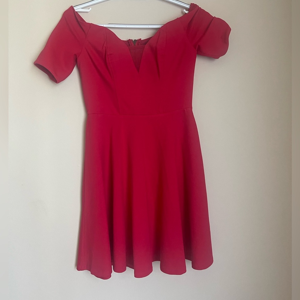 Guess red dress with tags.Size 0. brand new. Off shoulder and flare dress